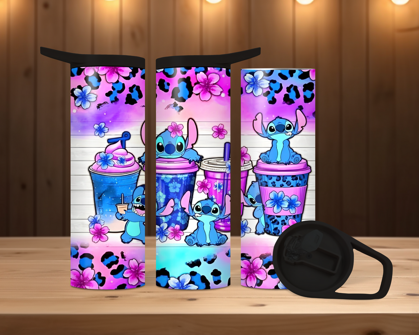 20oz Duo Skinny Tumbler - Cheetah/Aloha print with cute little blue guy! Our duo tumblers come with 2 screw on lids, one with sip spout and a carabiner clip, the other is a clear sliding style lid! Perfect for hot or cold beverages!